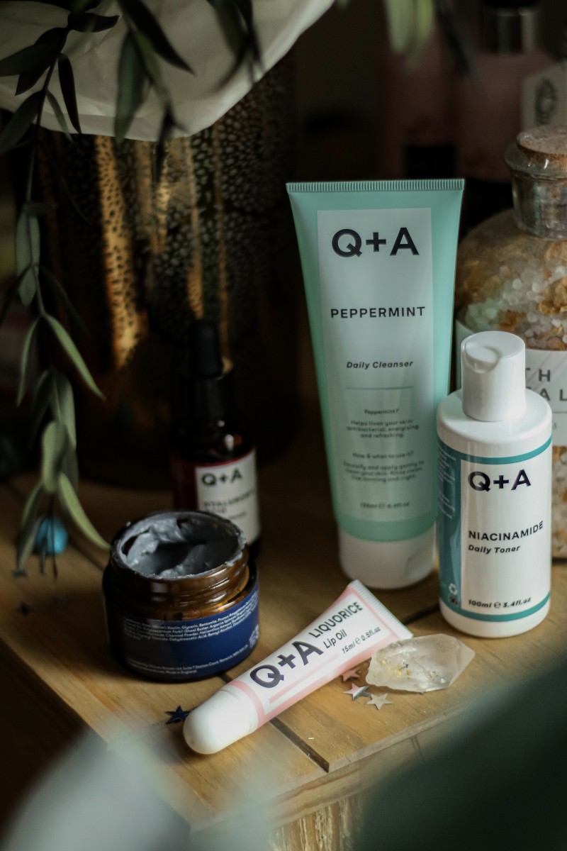 Q+A Natural Skincare products health flatlay of all products